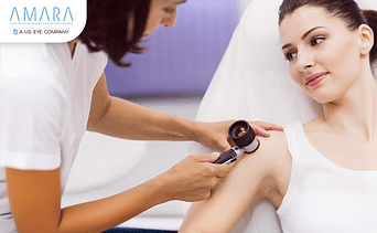 Dermatologist checking a patient