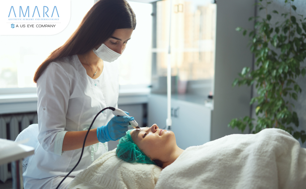 Specialist performing advanced dermatology treatments on a patient’s face in a modern clinic setting.